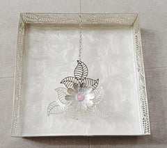 Silver Filigree Tray with Textured White Resin Base & Hanging Floral Motif