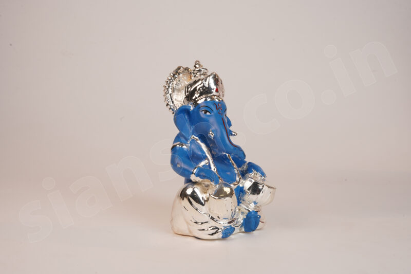 Silver Plated Ganesha holding Musical Instrument