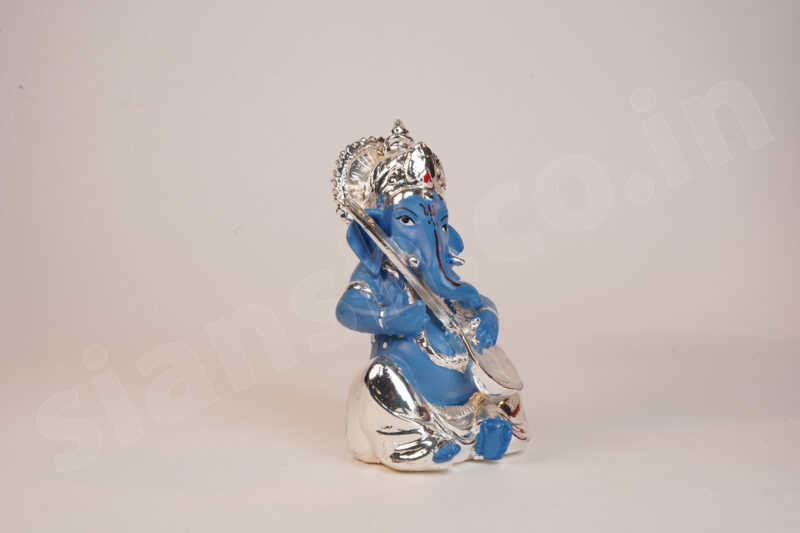 Silver Plated Ganesha holding Musical Instrument