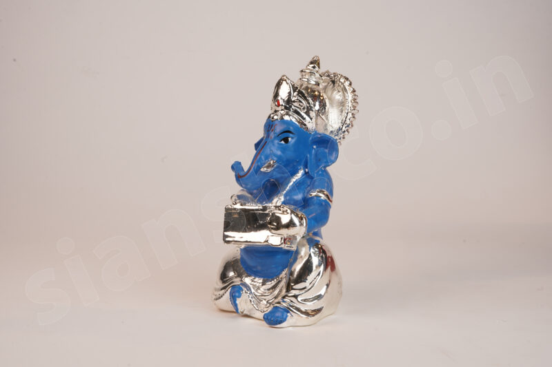 Silver Plated Ganesha holding Musical Instrument